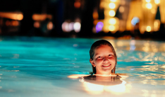 M.R. Electricians Illuminated Pool And Girl Swimming
